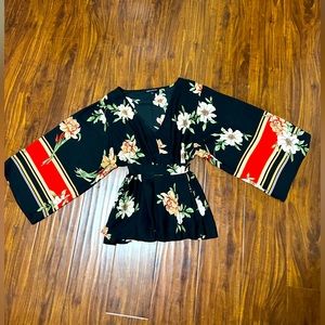 Kimono sleeve floral blouse with waist tie detail. New without tags.